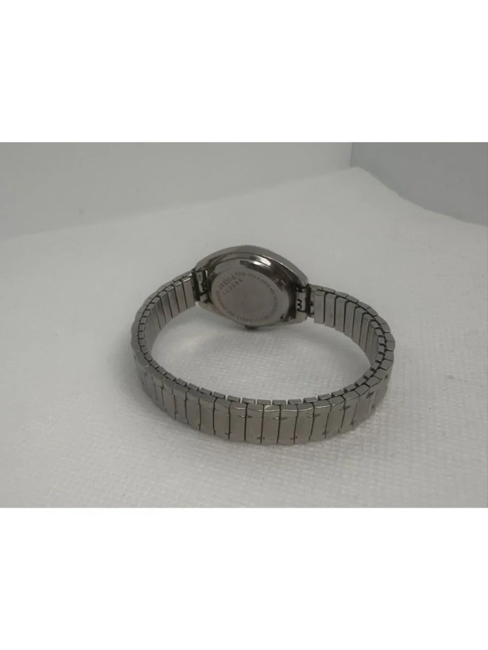 Vintage Pulsar 960029 Women Silver-Tone Fluted Bezel Day-Date Quartz Watch
